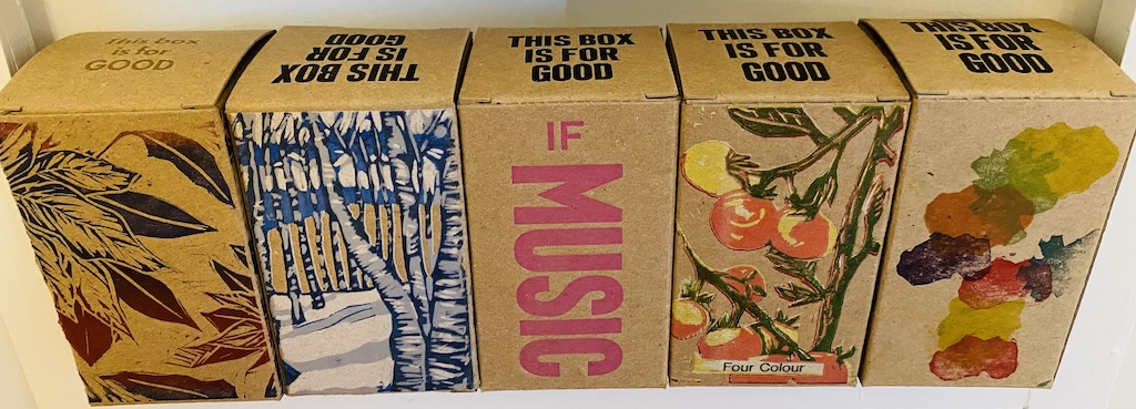 Five of our This Box is for Good boxes, arranged side by side.