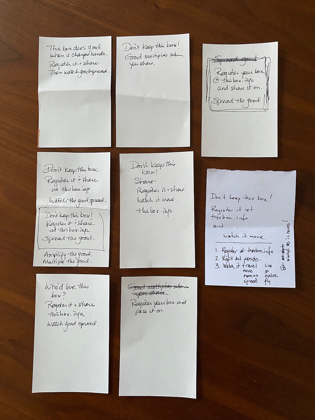 Notecards laid out on a table with brainstormed ideas for the call to action card.