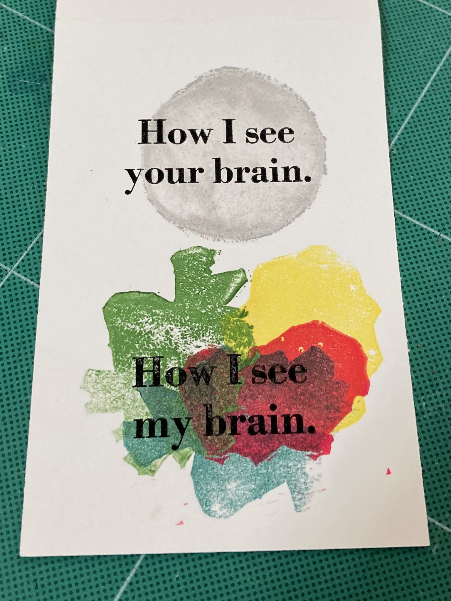 A white notecard, with "How I see your brain" printed at the top, over a simple grey circle, and "How I see my brain" at the bottom, printed over a collection of multi-colour jagged shapes.