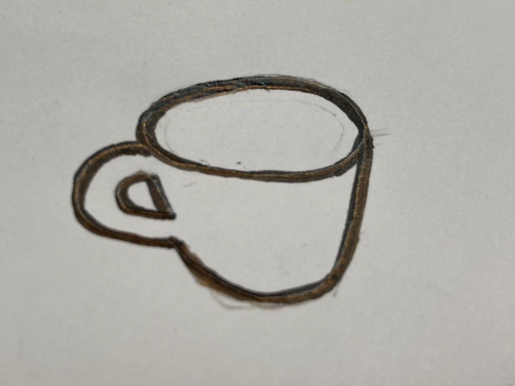 A simple black and white sketch of a small coffee cup.