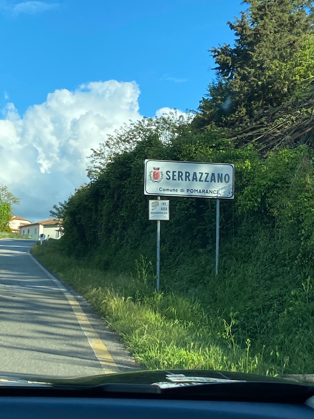 Serrazzano village sign at the outskirts.