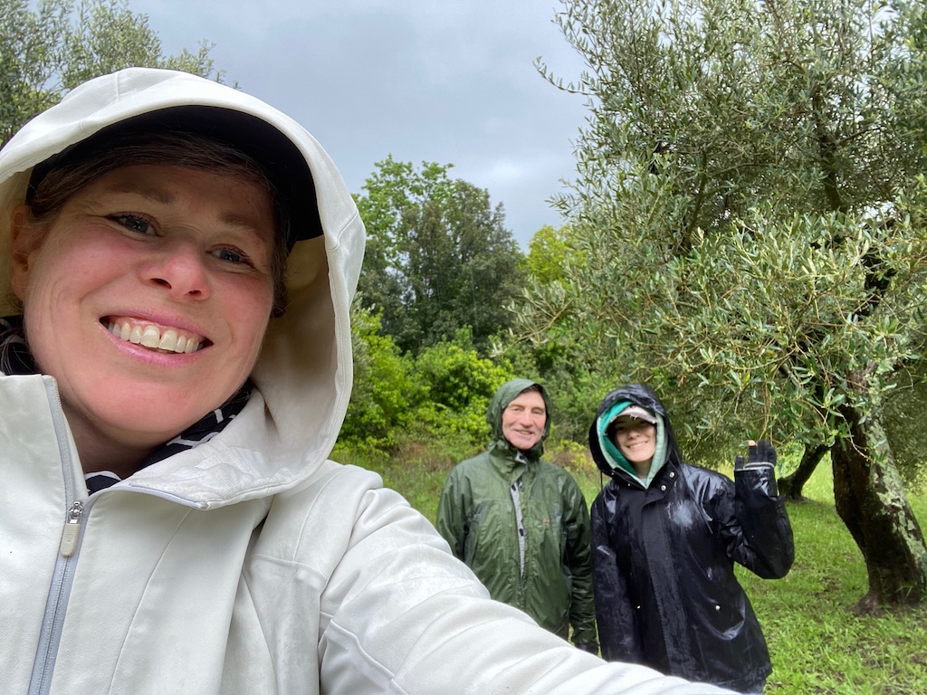 Lisa, Franco, and Lali gathering greenery.