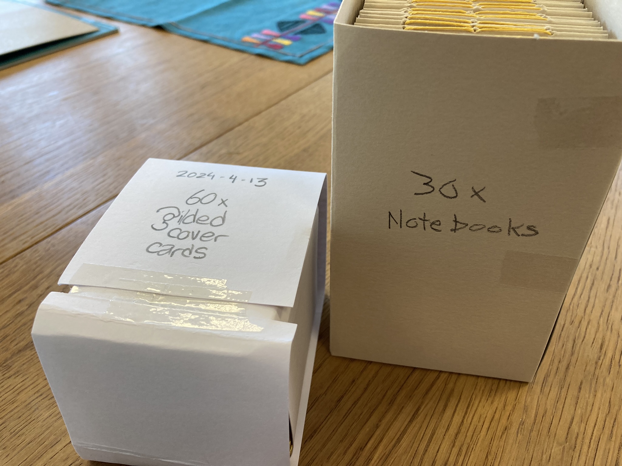 Package of notebooks and package of cards to glue to them.
