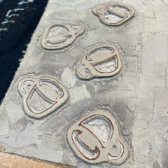 Lino block carved with espresso cups.