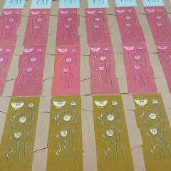 Three colours of the printed box, set to dry.