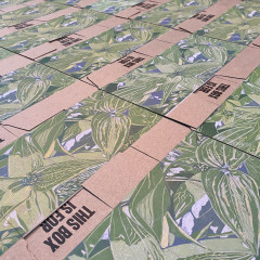 Unassembled printed boxes, set to dry.