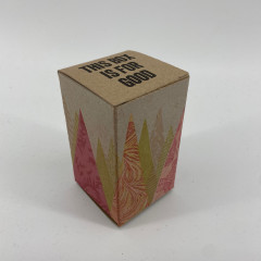 The box, assembled, by itself, taken from an angle above and to the left, against a white background.