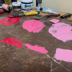 Various shades of red and pink ink.