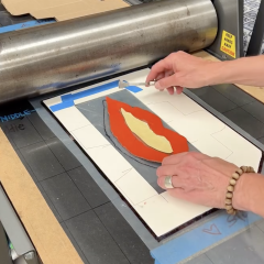 Lino block on the press